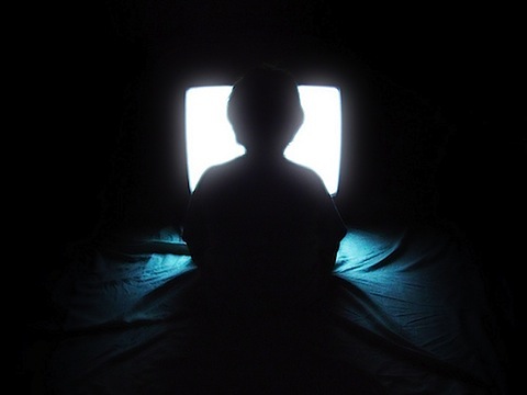 watching television