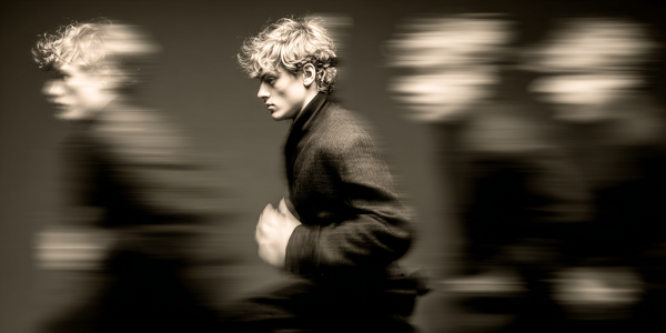a good-looking young man rushing about